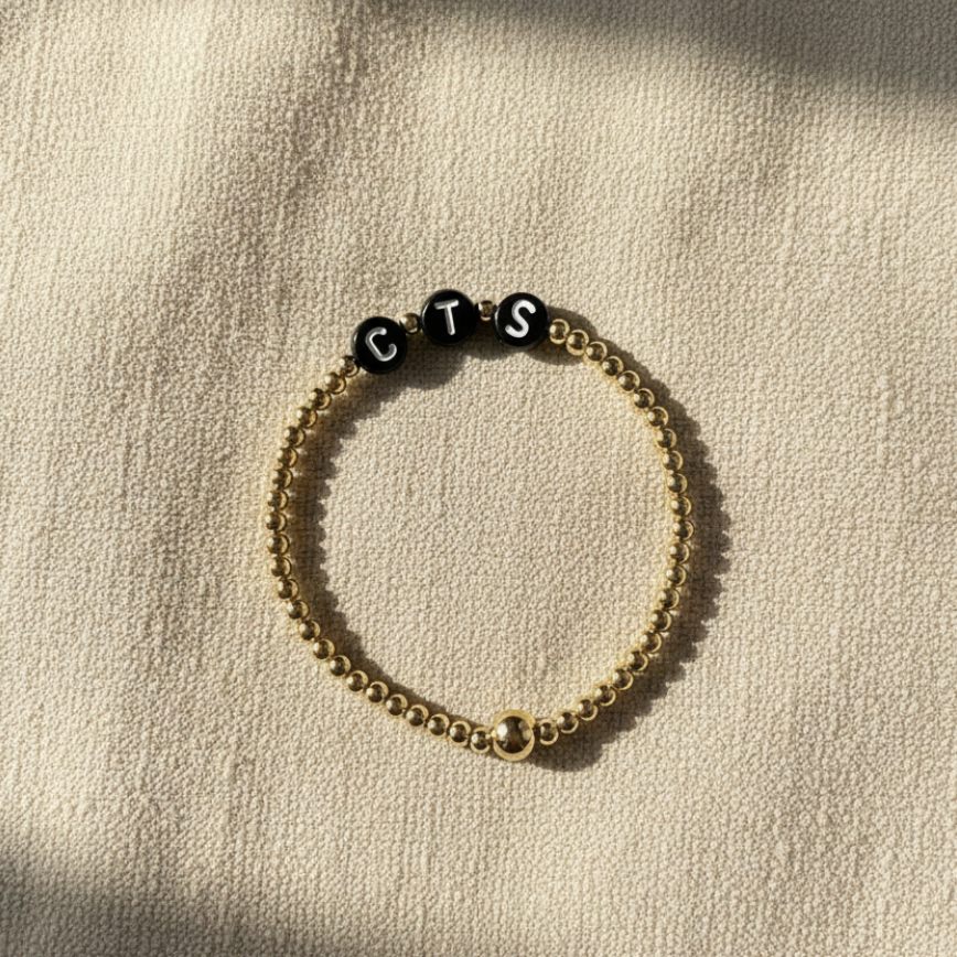The Names We Carry | 14K Gold-Filled Bracelet With Black Letter Beads